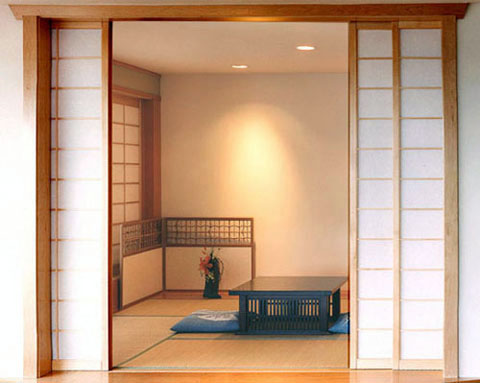 Shoji screens enclose an elegant tatami room