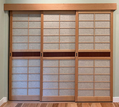 Custom shoji screens for an bedroom closet. Beech with Sapele mid-panels