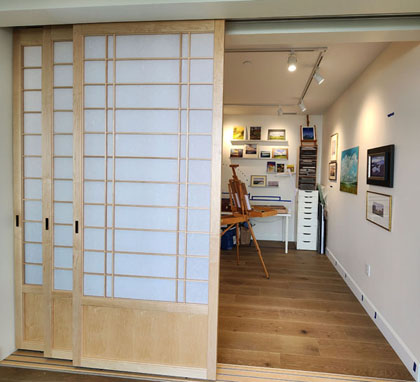 Custom shoji screens for an art studio. Maple with lower door panels