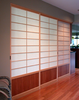 Shoji screen room dividers separating the guest room from the entry.