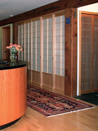 These shoji screens conceal the pantry closet and messy cork board - calendar wall.